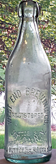 WEST END BREWING COMPANY EMBOSSED BEER BOTTLE