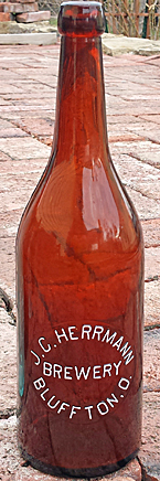 J. C. HERRMANN BREWERY EMBOSSED BEER BOTTLE