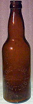 THE HOME BREWING COMPANY EMBOSSED BEER BOTTLE