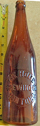 THE HOME BREWING COMPANY EMBOSSED BEER BOTTLE