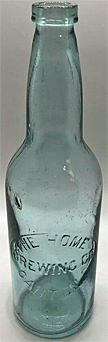 THE HOME BREWING COMPANY EMBOSSED BEER BOTTLE