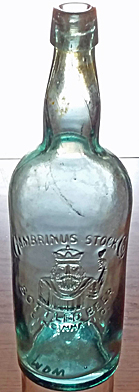 GAMBRINUS STOCK COMPANY BOTTLED BEER EMBOSSED BEER BOTTLE