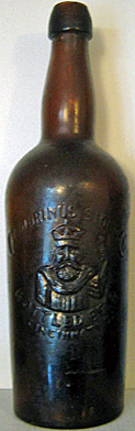 GAMBRINUS STOCK COMPANY BOTTLED BEER EMBOSSED BEER BOTTLE