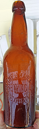 THE JOHN HAUCK BREWING COMPANY EMBOSSED BEER BOTTLE