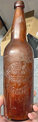 THE JOHN HAUCK BREWING COMPANY EMBOSSED BEER BOTTLE