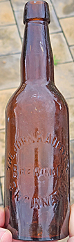 THE JOHN KAUFFMAN BREWING COMPANY EMBOSSED BEER BOTTLE