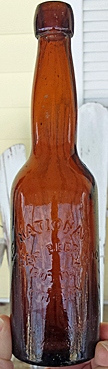 NATIONAL LAGER BEER BOTTLING COMPANY EMBOSSED BEER BOTTLE