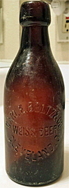 CARL E. BELTZ WEISS BIER EMBOSSED BEER BOTTLE