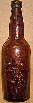 F STEINLE BREWING COMPANY EMBOSSED BEER BOTTLE