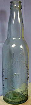 THE CROCKERY CITY BREWING COMPANY EMBOSSED BEER BOTTLE