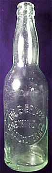 THE E. BECKER BREWING COMPANY EMBOSSED BEER BOTTLE