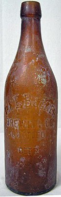 THE E. BECKER BREWING COMPANY EMBOSSED BEER BOTTLE