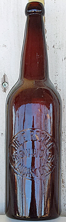 THE E. BECKER BREWING COMPANY EMBOSSED BEER BOTTLE