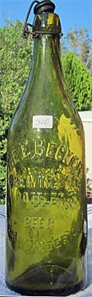 THE E. BECKER BREWING COMPANY EMBOSSED BEER BOTTLE