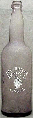 THE QUILNA BREWING COMPANY EMBOSSED BEER BOTTLE