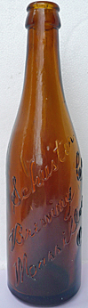 SCHUSTER BREWING COMPANY EMBOSSED BEER BOTTLE