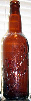 SCHUSTER BREWING COMPANY EMBOSSED BEER BOTTLE