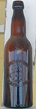 CONSUMERS BREWING COMPANY EMBOSSED BEER BOTTLE