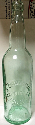 THE GRASSER AND BRAND BREWING COMPANY EMBOSSED BEER BOTTLE