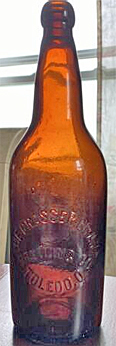 THE GRASSER AND BRAND BREWING COMPANY EMBOSSED BEER BOTTLE