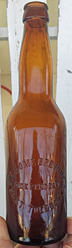 THE HOME BREWING COMPANY EMBOSSED BEER BOTTLE