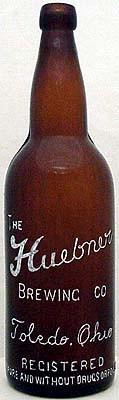 THE HUEBNER BREWING COMPANY EMBOSSED BEER BOTTLE