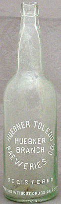 HUEBNER TOLEDO BREWERIES COMPANY EMBOSSED BEER BOTTLE