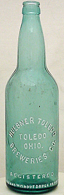 HUEBNER TOLEDO BREWERIES COMPANY EMBOSSED BEER BOTTLE