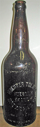 HUEBNER TOLEDO BREWERIES COMPANY EMBOSSED BEER BOTTLE