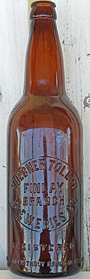 HUEBNER TOLEDO BREWERIES COMPANY EMBOSSED BEER BOTTLE