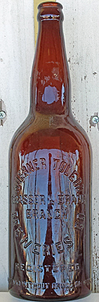 HUEBNER TOLEDO BREWERIES COMPANY EMBOSSED BEER BOTTLE