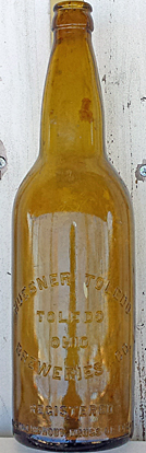 HUEBNER TOLEDO BREWERIES COMPANY EMBOSSED BEER BOTTLE