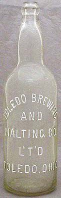 TOLEDO BREWING AND MALTING COMPANY LIMITED EMBOSSED BEER BOTTLE