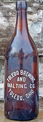 TOLEDO BREWING AND MALTING COMPANY EMBOSSED BEER BOTTLE