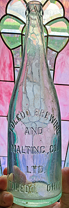 TOLEDO BREWING AND MALTING COMPANY LIMITED EMBOSSED BEER BOTTLE