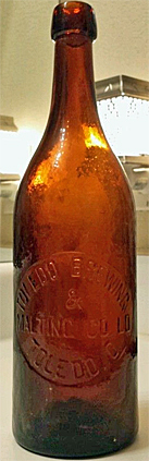 TOLEDO BREWING AND MALTING COMPANY LIMITED EMBOSSED BEER BOTTLE