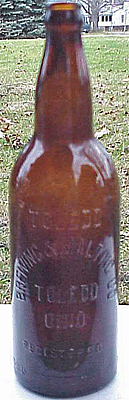 TOLEDO BREWING AND MALTING COMPANY EMBOSSED BEER BOTTLE