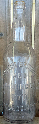 TOLEDO BREWING AND MALTING COMPANY LIMITED EMBOSSED BEER BOTTLE