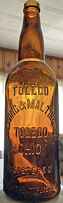 TOLEDO BREWING AND MALTING COMPANY EMBOSSED BEER BOTTLE