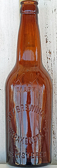 CITY BREWING COMPANY EMBOSSED BEER BOTTLE