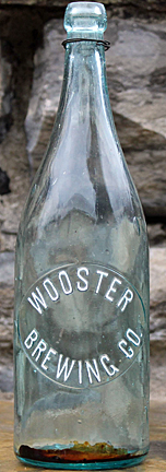 WOOSTER BREWING COMPANY EMBOSSED BEER BOTTLE