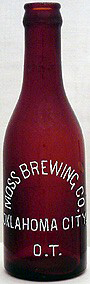 MOSS BREWING COMPANY EMBOSSED BEER BOTTLE