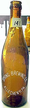 SPRING BREWING COMPANY EMBOSSED BEER BOTTLE