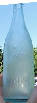 SPRING BREWING COMPANY EMBOSSED BEER BOTTLE