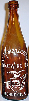 AMERICAN BREWING COMPANY EMBOSSED BEER BOTTLE