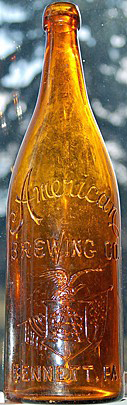 AMERICAN BREWING COMPANY EMBOSSED BEER BOTTLE