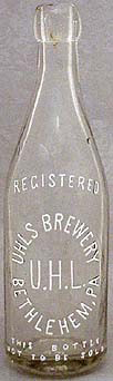 UHLS BREWERY EMBOSSED BEER BOTTLE