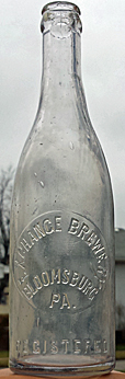 EXCHANGE BREWERY EMBOSSED BEER BOTTLE