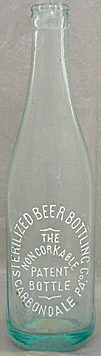 STERILIZED BEER BOTTLING COMPANY EMBOSSED BEER BOTTLE