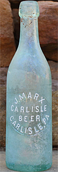 J. MARX CARLISLE BEER EMBOSSED BEER BOTTLE